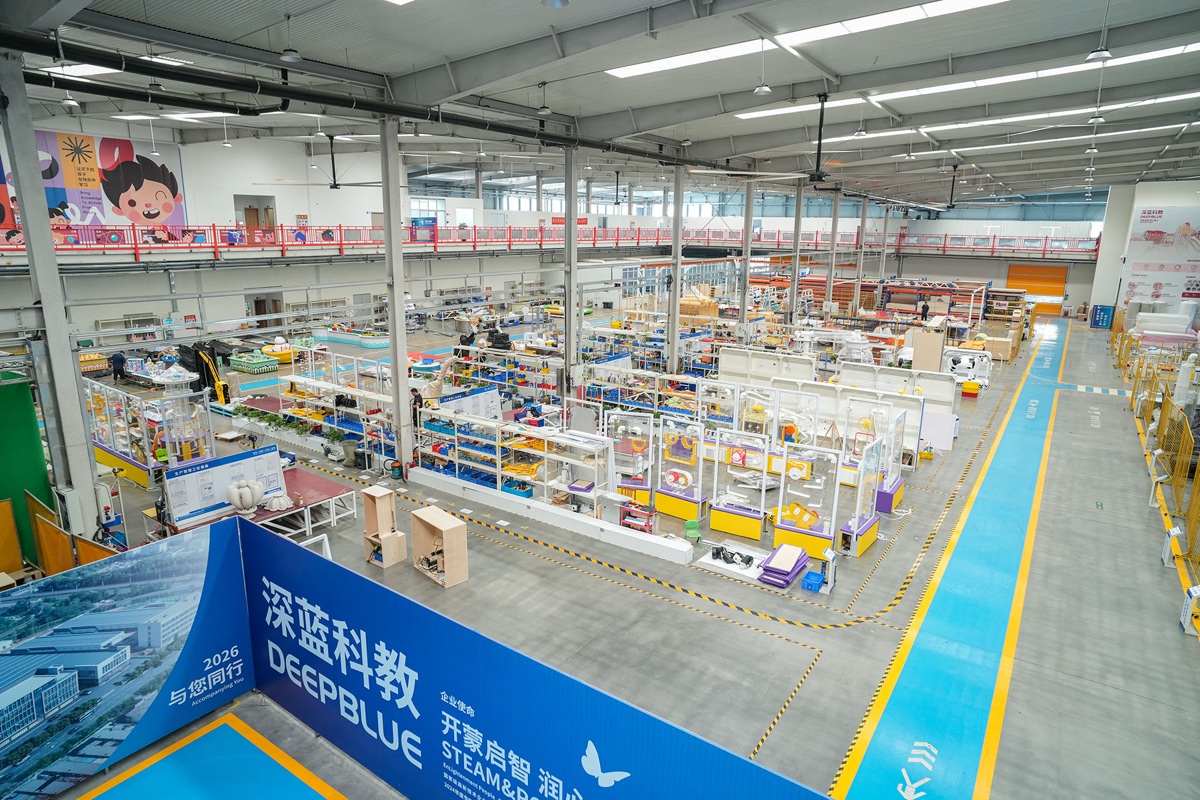 DEEPBLUE super factory interior showing organized exhibit assembly areas and marked logistics lanes DEEPBLUE super factory interior showing organized exhibit assembly areas and marked logistics lanes