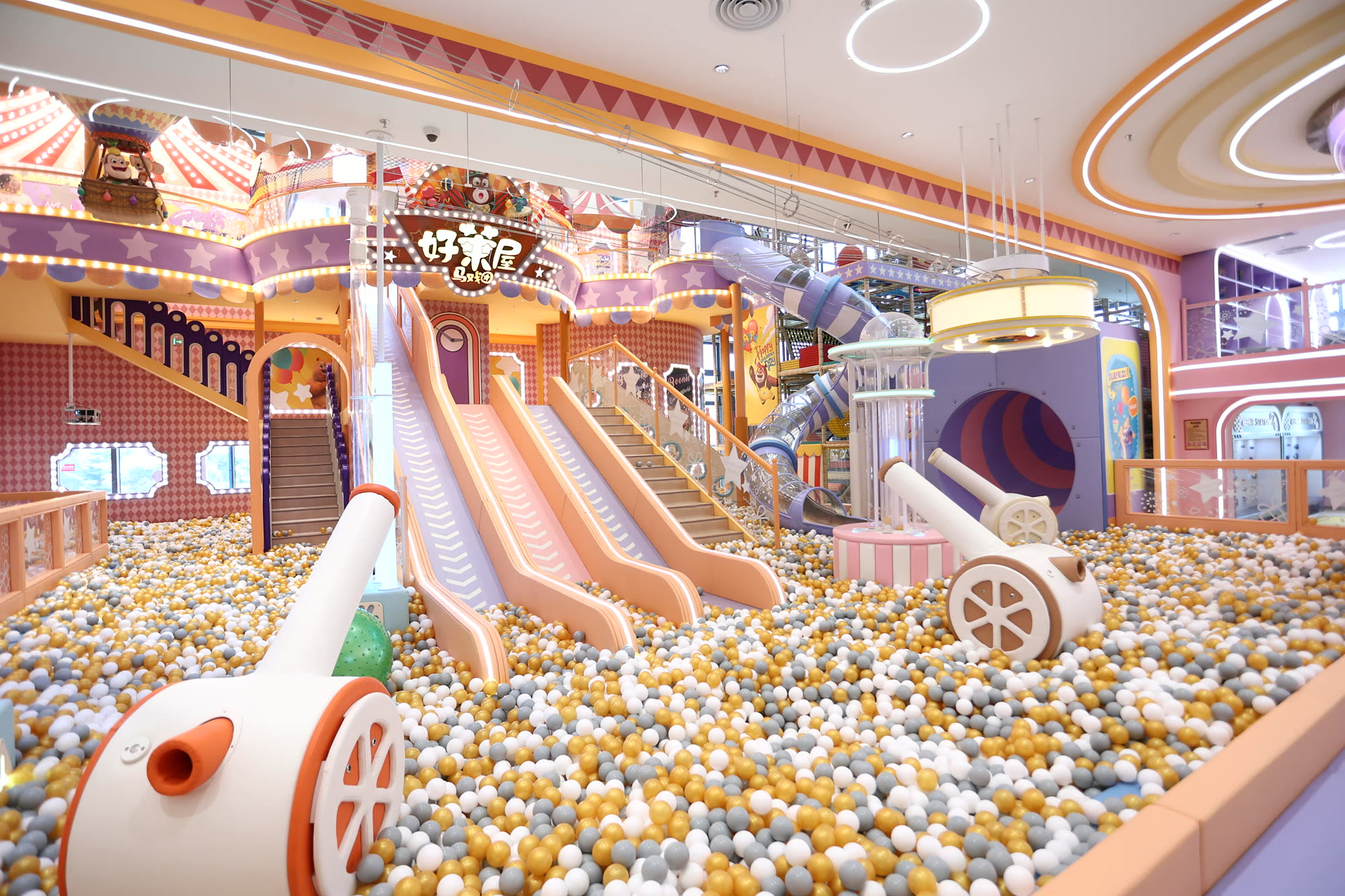 Indoor children's playground with custom climbing and play equipment Indoor children's playground with custom climbing and play equipment