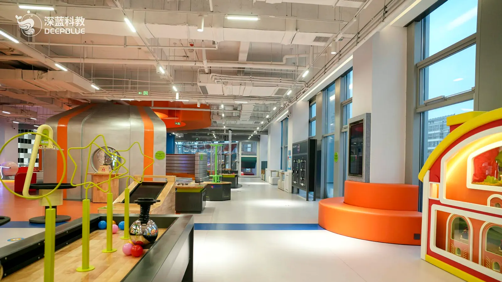 Completed XPLOPLO gallery showing coordinated space and exhibits in a children's museum