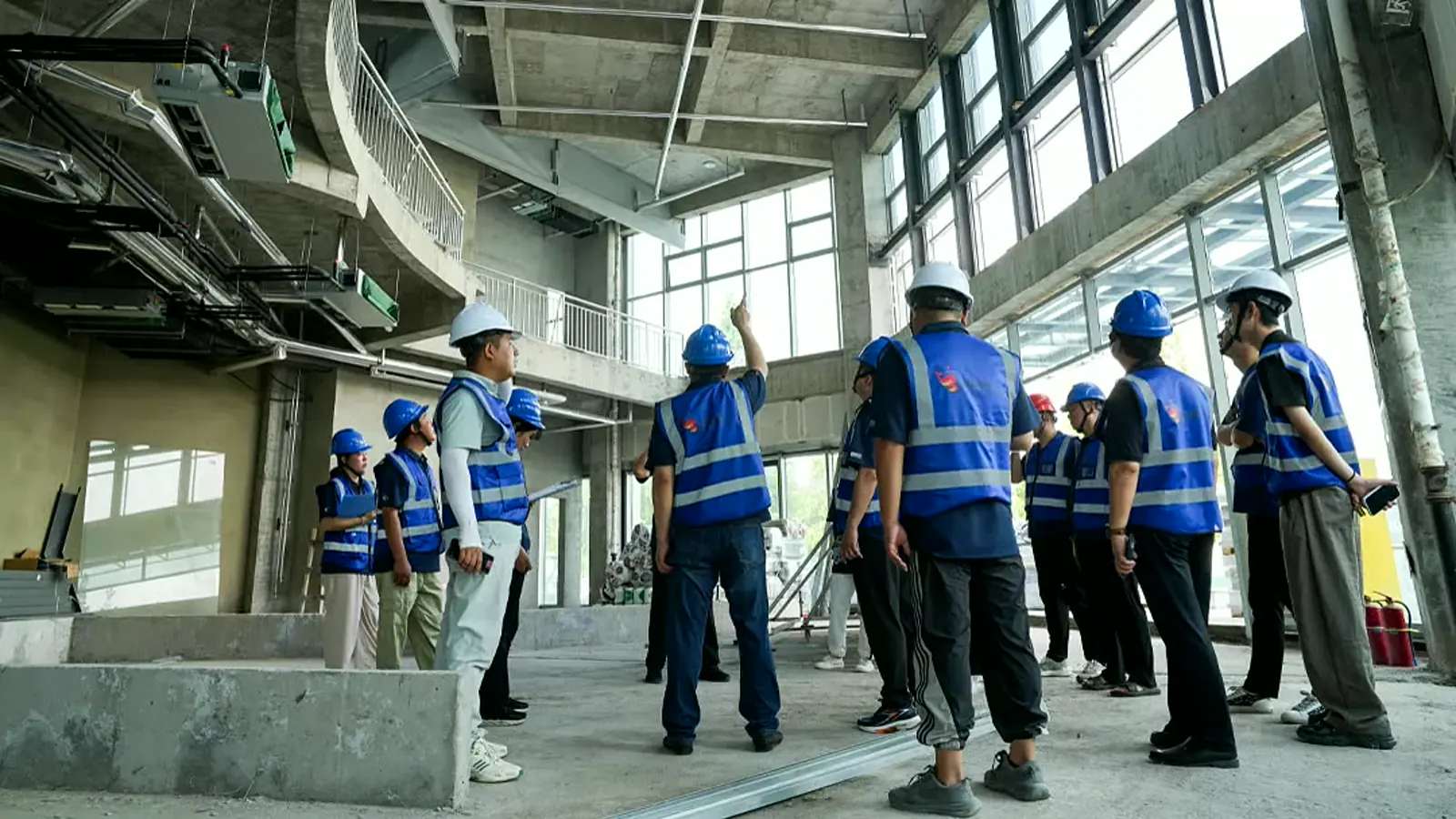 Project team reviewing an unfinished venue for whole museum site responsibility and readiness checks