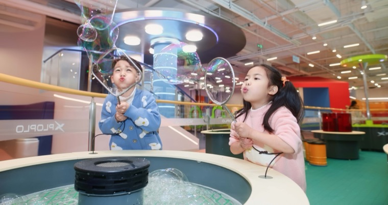 Real XPLOPLO operation photo 13 showing children smiling, exploring and learning through play