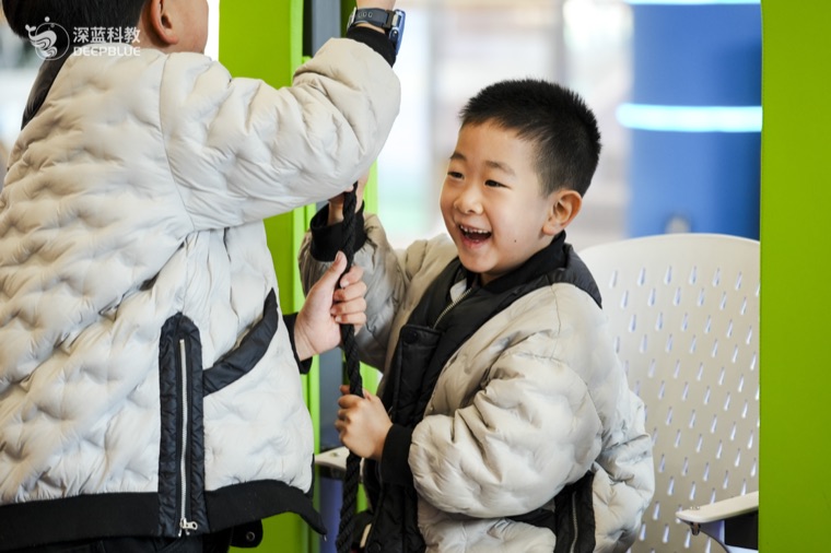 Real XPLOPLO operation photo 18 showing children smiling, exploring and learning through play